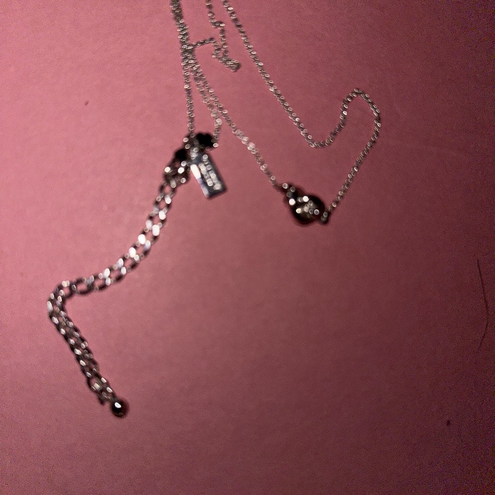 Kate Spade silver tone twisted knot heart necklace - Picture 5 of 5